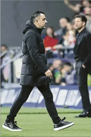  ?? FOTO: GETTY ?? Sánchez Martínez expulsó a Xavi durante la primera parte del Atlético-barça