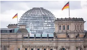  ?? FOTO: DPA ?? Von der Kuppel auf dem Reichstag aus hat man einen schönen Blick über die Hauptstadt Berlin.