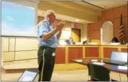  ?? EVAN BRANDT — DIGITAL FIRST MEDIA ?? Pottstown Police Chief Richard Drumheller explains the benefits of street surveillan­ce cameras during a recent borough council meeting.