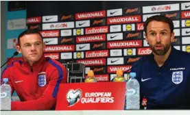  ??  ?? Wayne Rooney, left, and Gareth Southgate, right, address the media earlier this week