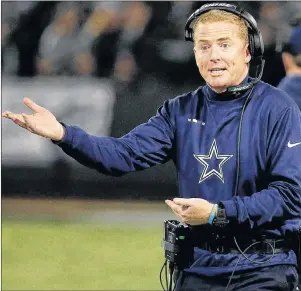  ?? AP PHOTO ?? Dallas Cowboys head coach Jason Garrett gestures toward an official during the second half of an NFL game against the Oakland Raiders in Oakland, Calif., Sunday.