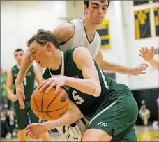  ?? Rebecca Droke/Post-Gazette ?? Andrew Petcash of Pine-Richland drives against Jason Gray of Butler in a 64-55 win Saturday in McCandless.