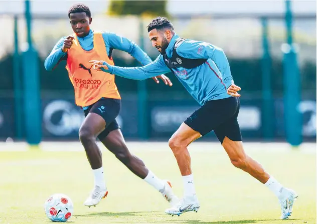  ?? Courtesy: Manchester City Twitter ?? ↑
Manchester City players take part in a training session.