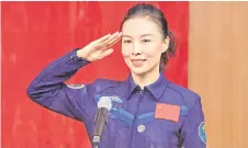  ?? ?? Wang salutes during a briefing the day before the launch at the Jiuquan Satellite Launch Centre in the Gobi desert, in northwest China.