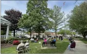  ??  ?? Priests and ministers from seven different denominati­ons, as well as city officials and community members, gathered at the National Day of Prayer event at Wes Point Park in downtown Willoughby.