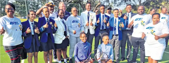  ?? ?? MEC Mbali Frazer (centre), joined by EHS principal Sizwe Zwane (second right) and King Cetshwayo District acting director of education Welile Nzama (far right), with pupils at the unveiling of the multi-purpose court