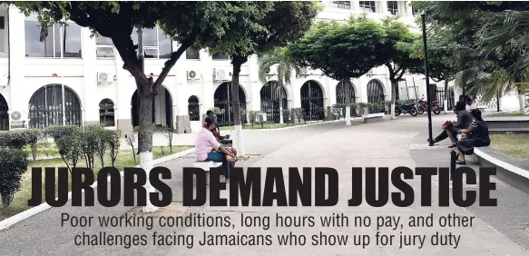  ?? FILE ?? Persons sit on benches next to the Supreme Court building in downtown Kingston.