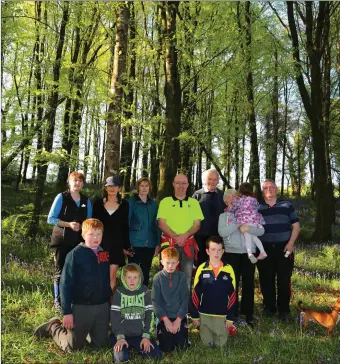  ??  ?? Con O’Sullivan of IRD Duhallow leading a group in the Island Wood walk in Newmarket as part of the Bealtaine Festival. Photos: Sheila Fitzgerald