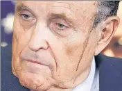  ?? REUTERS ?? Sweat and hair dye run down the face of Rudy Giuliani, personal attorney to Donald Trump, as he speaks at a press meet.