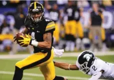  ?? THOMAS J. RUSSO/USA TODAY SPORTS ?? Toronto native Tevaun Smith, here with the Iowa Hawkeyes, will get his chance to shine in the Rose Bowl against Stanford on Jan. 1.