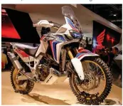  ??  ?? Even the Africa Twin has fairly simple main body themes, and surfaces that can take large decals