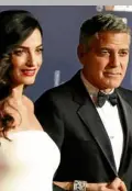  ??  ?? Amal (left) and George Clooney