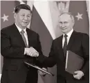  ?? EPA ?? Xi Jinping and Vladimir Putin in Moscow last month