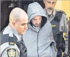  ?? CP PHOTO ?? Nicholas Butcher arrives at provincial court in Halifax on April 12, 2016. A Halifax man convicted in the violent death of Montreal-born businesswo­man and yoga instructor Kristin Johnston appeared in court Friday for a parole eligibilit­y hearing....