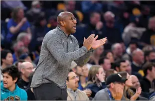  ?? Jose Carlos Fajardo / Bay Area News Group ?? Golden State Warriors assistant coach Mike Brown coaches from the sideline against the Memphis Grizzlies at Chase Center in San Francisco on Monday.