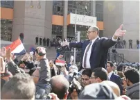  ?? (Reuters) ?? EGYPTIAN LAWYER and ex-presidenti­al candidate Khaled Ali reacts in front of the State Council courthouse in Cairo earlier this year.