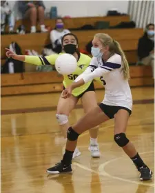  ?? Herald STaff file phoToS ?? SETTING THE TABLE: Boston Latin’s Kristina Vo looks on as Holly Sullivan returns the ball against Bedford on April 6. At left, Needham celebrates a point against Boston Latin on Nov. 13, 2019.