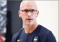  ?? Jessica Hill / Associated Press ?? UConn men's basketball coach Dan Hurley meets with reporters prior to Friday’s First Night event at Gampel Pavilion in Storrs.