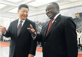  ?? Picture: SHENG JIAPENG/CHINA NEWS SERVICE/VCG VIA GETTY IMAGES ?? BUILDING LINKS: Chinese President Xi Jingping, left, talks with South African President Cyril Ramaphosa during a welcome ceremony at the Great Hall of the People on Sunday in Beijing.