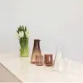  ??  ?? Right— The studio’s homeware range features glasses and carafes.