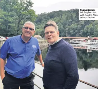  ??  ?? Signal issues MP Stephen Kerr with Gordon Allan at Loch Katrine