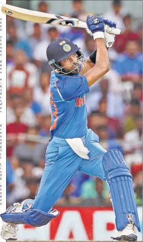  ?? REUTERS ?? Hardik Pandya, who wore his lucky Mumbai Indians gloves, combined with MS Dhoni to put on 118 for the sixth wicket, and captured two wickets to pick up the MoM award in the first ODI on Sunday.
