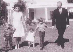  ?? CATHERINE FREEMAN ?? An enigma: John Freeman and family at the British Residence, New Delhi, in the Sixties