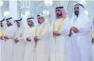  ??  ?? Sheikh Humaid bin Rashid Al Nuaimi offers Eid prayers at the Sheikh Rashid bin Humaid Al Nuaimi Mosque in Ajman.