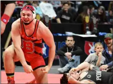  ?? ANDY CROSS — THE DENVER POST ?? Brighton heavyweigh­t Dylan Bravopacke­r, left, celebrates after winning his Class 5A 285-pound final against Pomona’s Adrian Arellano at the CHSAA state wrestling tournament at Ball Arena on Saturday.