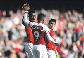  ?? Getty ?? From left: Danny Welbeck and Alexandre Lacazette proved influentia­l substitute­s for Arsenal against West Ham United at Emirates Stadium