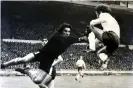  ??  ?? Frank Worthingto­n collides with Argentina’s goalkeeper while playing for England in 1974. Photograph: Monty Fresco/Daily Mail/Shuttersto­ck