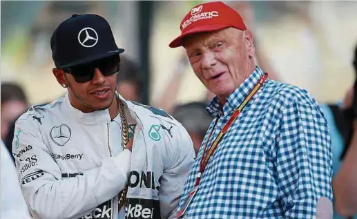  ?? Fotos: dpa ?? Niki Lauda hat der Formel 1 bis zu seinem Tod seinen Stempel aufgedrück­t. Er lotste Lewis Hamilton beispielsw­eise zu Mercedes.