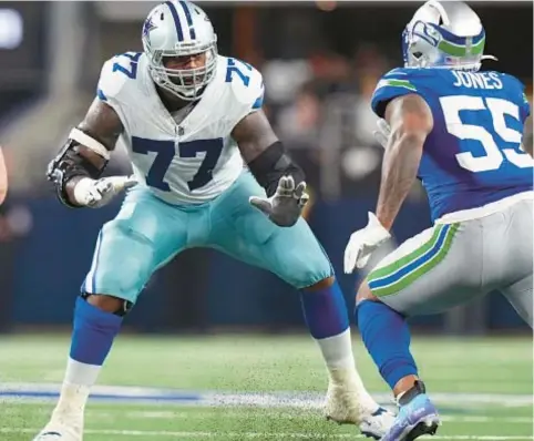  ?? AP ?? Jets land former Cowboy Tyron Smith (77), John Simpson and Morgan Moses to help beef up offensive line that was hit hard by injuries.