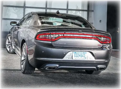  ?? — PHOTOS: CHRYSLER CANADA FILES ?? The Dodge moves with a confidence that belies its size, but fuel economy was iffy.