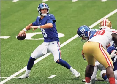  ?? Adam Hunger / Associated Press ?? New York Giants quarterbac­k Daniel Jones (8) in action against the San Francisco 49ers during an NFL game on Sunday in East Rutherford, N.J. The 49ers won 36-9.