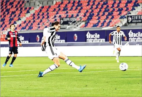  ?? AFP ?? Juventus’ midfielder Adrien Rabiot shoots to score the third goal during the Italian Serie A football match against Bologna on May 23.