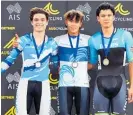  ?? Photo / Supplied ?? Lewis Johnston (centre) after the 2022 Oceania Track Cycling Championsh­ips in Brisbane.