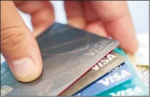  ??  ?? This file photo shows Visa credit cards in New Orleans. If you’ve been denied COVID-19 assistance for your credit cards or offered terms that are not sustainabl­e, credit counseling may get your finances on track. (AP)