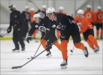  ?? YONG KIM — THE ASSOCIATED PRESS ?? The return of Flyers center Nolan Patrick, here skating during a practice last week, is a big reason for general manager Chuck Fletcher’s high hopes for the 2021 season.