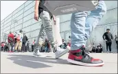  ?? ANDA CHU — STAFF PHOTOGRAPH­ER ?? Sneaker fans line up outside the Santa Clara Convention Center for Sneaker Con in Santa Clara on Saturday.