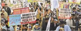  ?? AFP/GETTY IMAGES ?? Supporters of Pakistan’s banned Islamic group Jamaat-ud-Dawa protest against U.S. drone strikes Friday in Lahore, Pakistan.