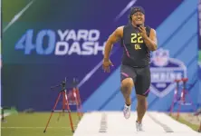  ?? Michael Hickey / Getty Images ?? Vea, the heaviest player at the draft combine, ran the 40-yard dash in 5.1 seconds, matching the time of a 224-pound QB.