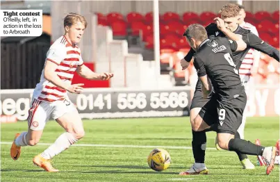  ?? ?? Tight contest O’reilly, left, in action in the loss to Arbroath