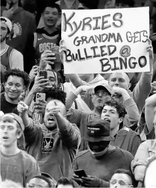  ?? MICHAEL DWYER/AP ?? Boston Celtics fans have done much worse than display signs when heckling Brooklyn Nets star Kyrie Irving.