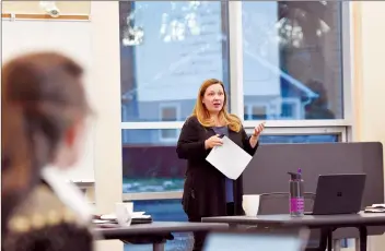  ?? NEWS PHOTO MO CRANKER ?? MHPSD’s district psychologi­st Claire Petersen speaks to the public school board Tuesday evening.