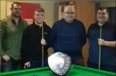  ??  ?? From left: Tommy Kavanagh (referee), Jordan Synnott (runner-up), John Doyle of Mylie Doyle’s shop (sponsor), Conor Coone (winner).