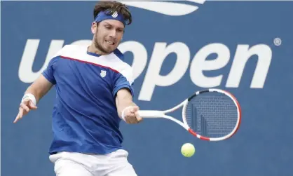  ??  ?? Cameron Norrie hits a return to Diego Schwartzma­n en route to a five-set victory over the Argentinia­n in the first round at Flushing Meadows. Photograph: Jason Szenes/EPA