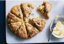  ?? FOOD STYLED BY SIMON ANDREWS. DAVID MALOSH/THE NEW YORK TIMES ?? A strawberry scone with dried berries for these crisp-outside, tender-inside treats.