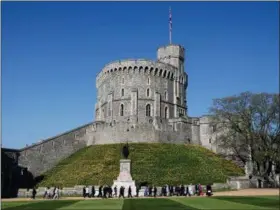  ?? FRANK AUGSTEIN — THE ASSOCIATED PRESS FILE ?? In this file photo, leaders of Commonweal­th countries arrive and walk past the round tower at Windsor Castle for the second day of the Commonweal­th Heads of Government 2018 for a behind closed doors meeting in Windsor, England.