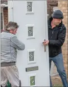  ??  ?? GRAFTER: Steve Thomson helping fit a door and, right, carrying his tool box